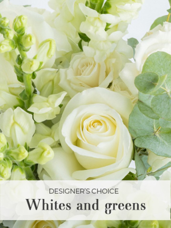 Lush 25-stem bouquet of white and cream florals mingled with premium greenery, tightly arranged and raffia-wrapped for a generous, elegant gift designed to impress.