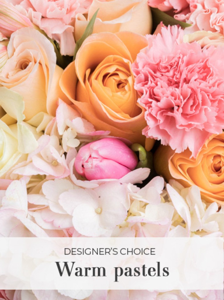 A full and expressive 25-stem mix of warm pastel blooms and lush greenery, designed to bring a cozy glow and natural charm to any room or celebration.